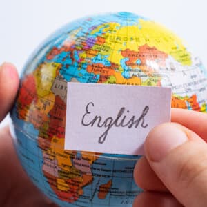 The image shows a globe with an English word highlighted.
