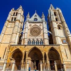 Image of a button for the Spanish program, showcasing the Cathedral of San Marcial de Barcelona.