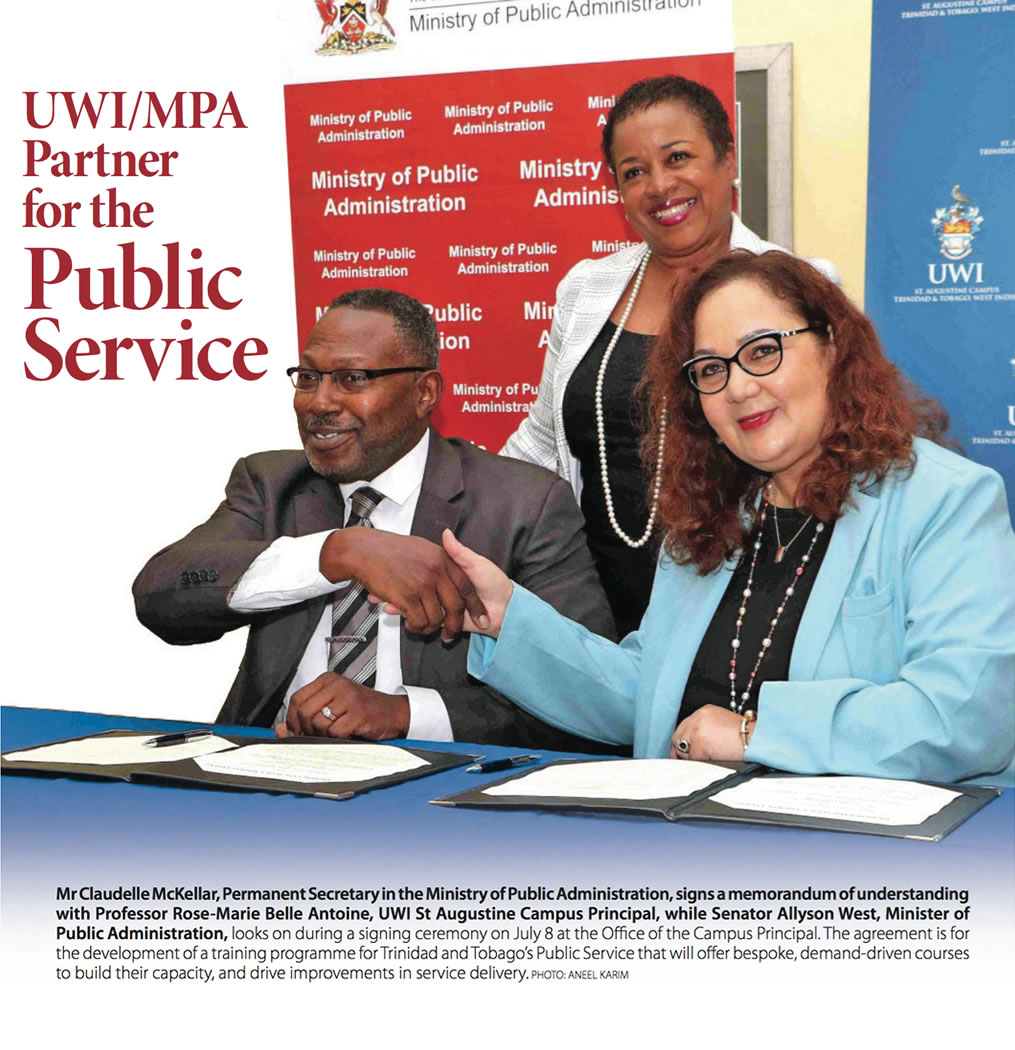 Mr Claudelle McKellar, Permanent Secretary in the Ministry of Public Administration, signs a memorandum of understanding with Professor Rose-Marie Belle Antoine, UWI St Augustine Campus Principal, while Senator Allyson West, Minister of Public Administration, looks on during a signing ceremony on July 8 at the Office of the Campus Principal. The agreement is for the development of a training programme for Trinidad and Tobago’s Public Service that will offer bespoke, demand-driven courses to build their capacity, and drive improvements in service delivery.